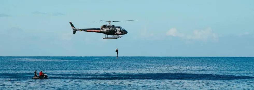 Man jumps out of helicopter into ocean