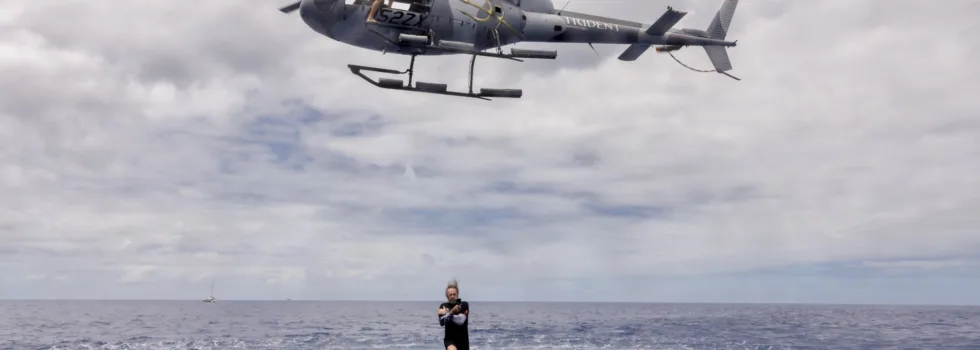 Helicopter jumping ocean oahu