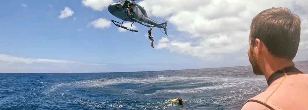 Man jumps from helicopter into oahu ocean while friend watches