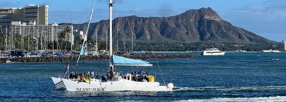 Waikiki catamaran blue sails