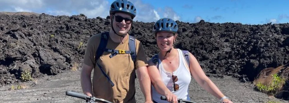 Couple during volcano bike tour hawaii