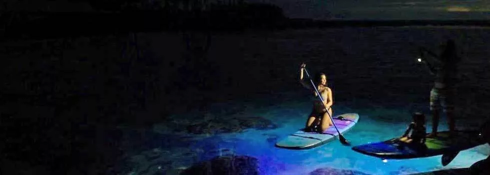 Glow paddle boarding night kona