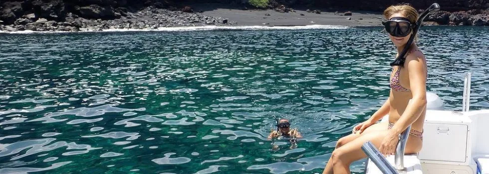 South kona black sand beach snorkeler