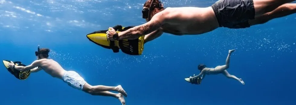 Friends sea scooter snorkeling napili