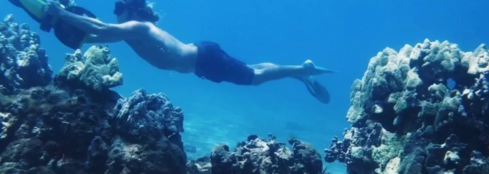 Sea scooter snorkel over coral reef