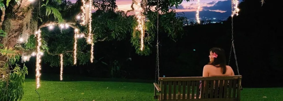 Luau bench swing at night