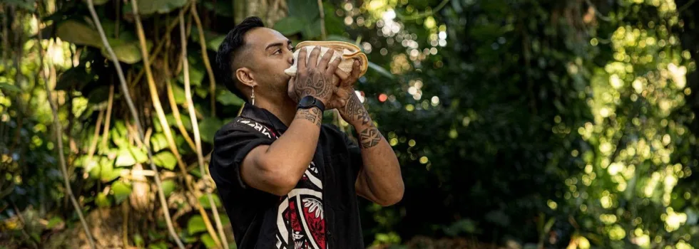 Mountain luau oahu conch shell blowing