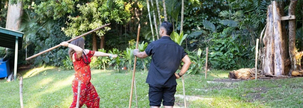 Oahu mountain luau spear throwing game