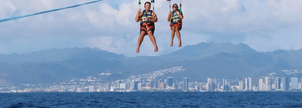 Couple parasails waikiki