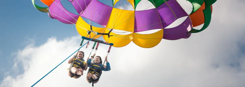 Guests flying during hawaii parasailing