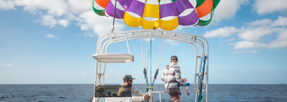 Guests prepare for parasail lift off