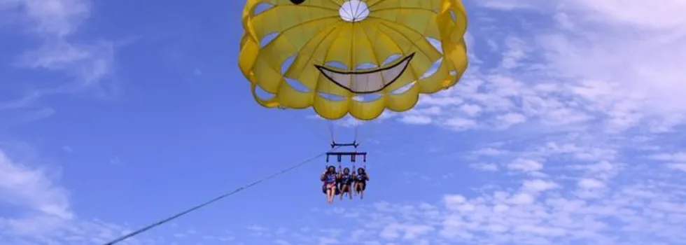 Yellow happy face parasailing hawaii