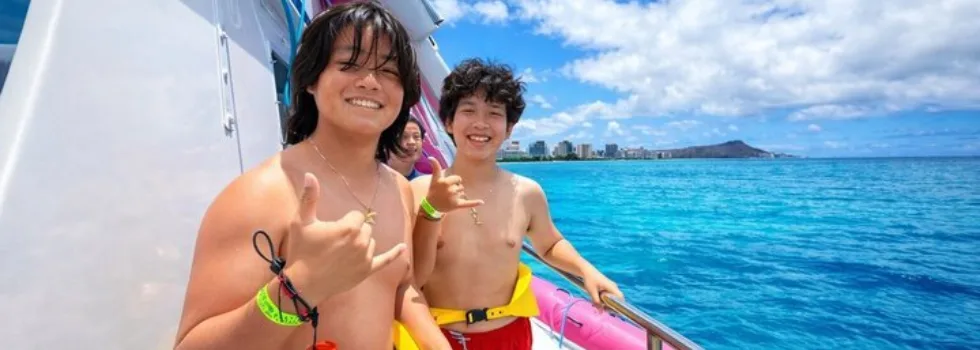 Boys learn to snorkel waikiki catamaran