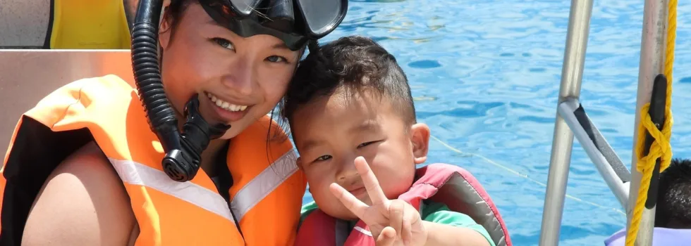 Mother child on waikiki catamaran
