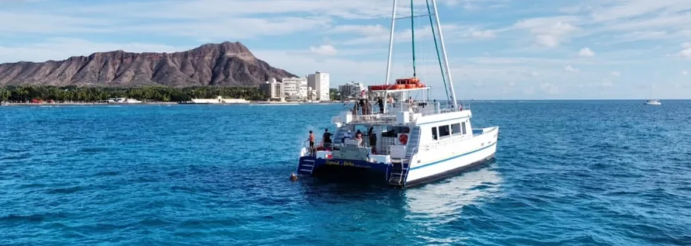 Waikiki activity catamaran near diamond head