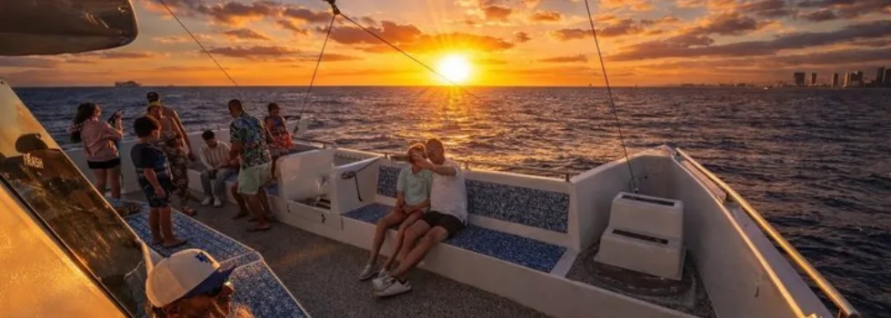 Sunset couple selfie on catamaran
