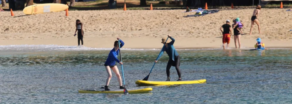 Woman tries SUP in waikiki