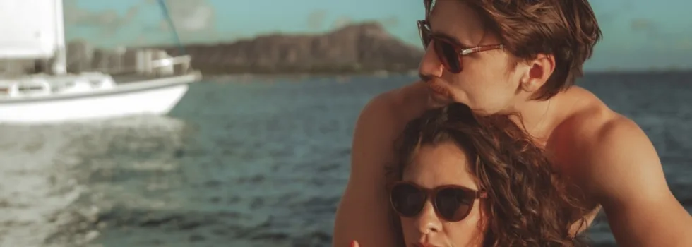 Cuddling couple waikiki boat