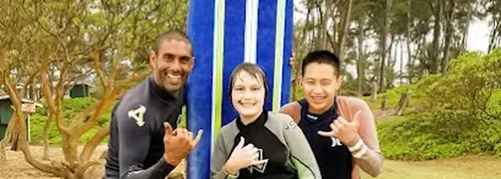 Surf instructor with students oahu