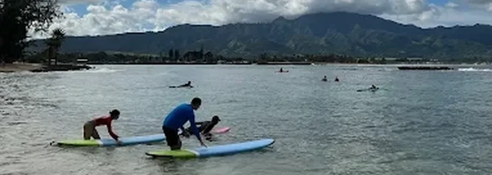 Surf school entering water north shore oahu