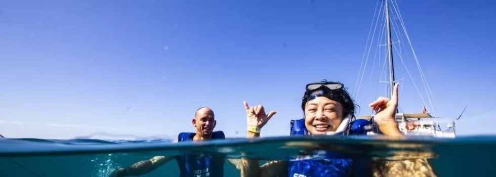 Happy snorkelers in waikiki