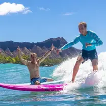 Jamie O’Brien Waikīkī Surf Lessons: Guy learns to surf while instructor cheers thumb png