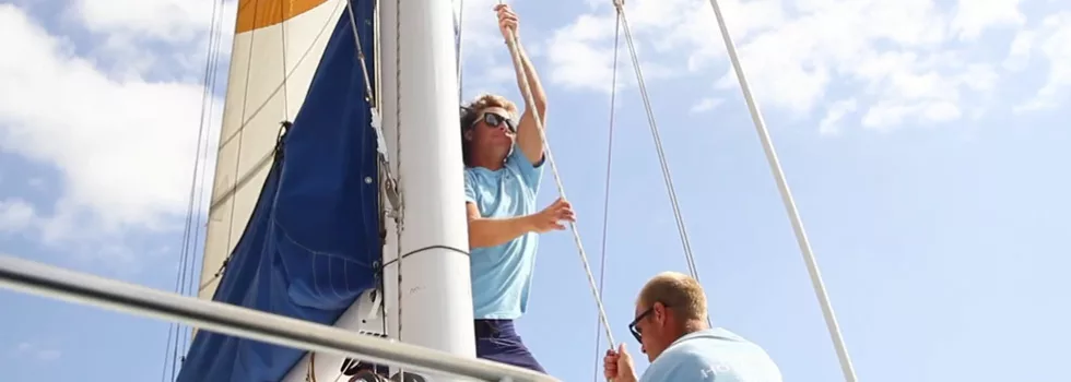 Napali raising main sail