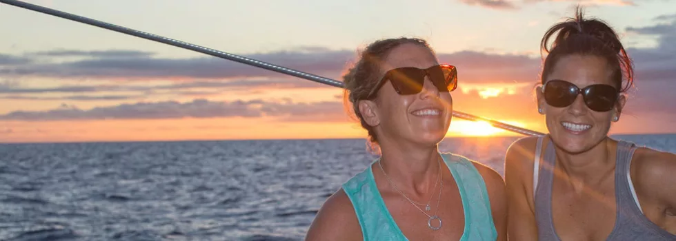 Friends sailing sunset kauai