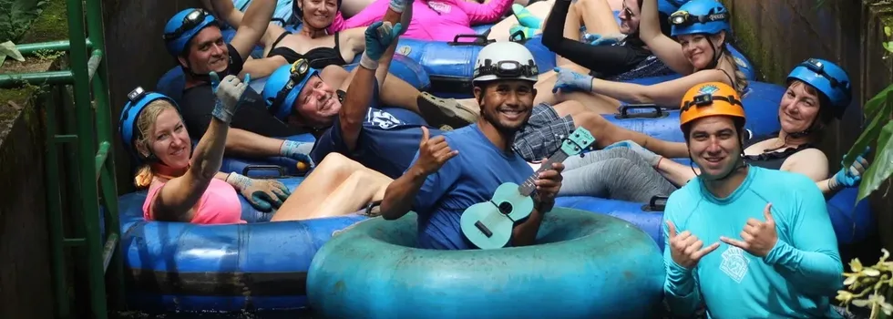 Kauai group tubing down river