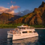 Luxury boat tour at sunset kalalau valley thumb