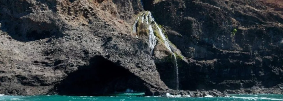 Sea cliff waterfall kauai