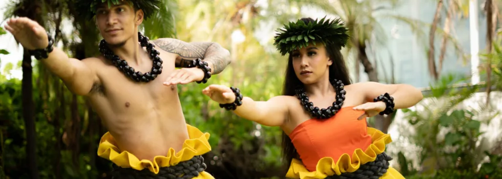 Male and female hula dancer