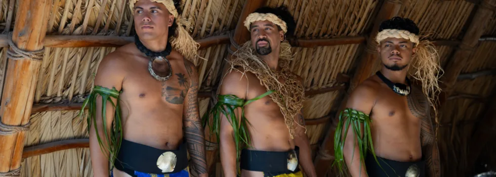 Male hula dancers luau