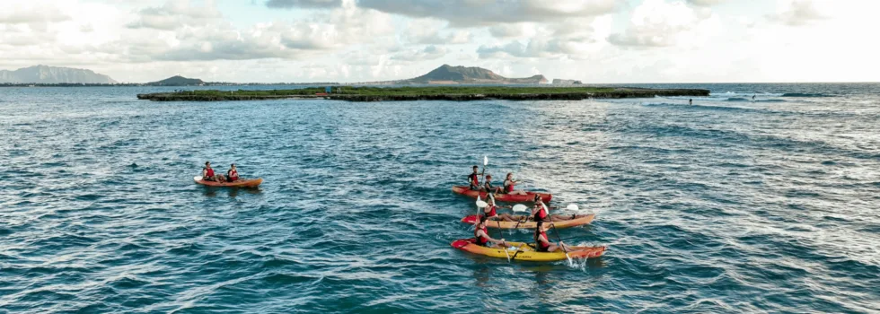 Kayaks leaving flat island kailua
