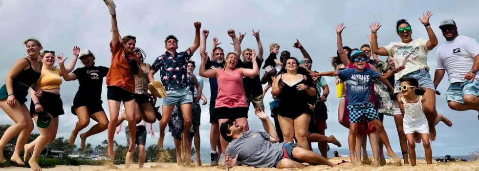 Group jumping at ehukai beach park