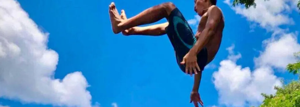 Jumping into north shore oahu river