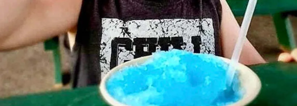 Kid eats shave ice haleiwa