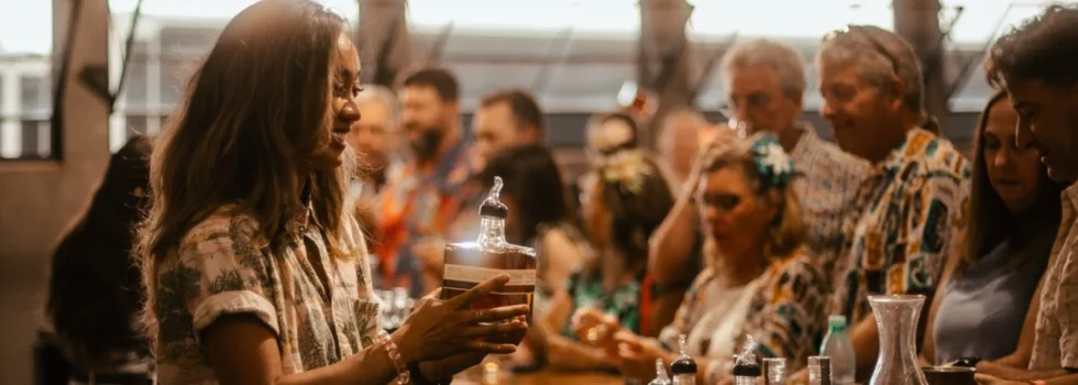 Rum guide pouring guests oahu