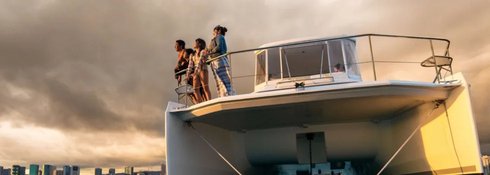 Luxury boat charter waikiki family watches sunset