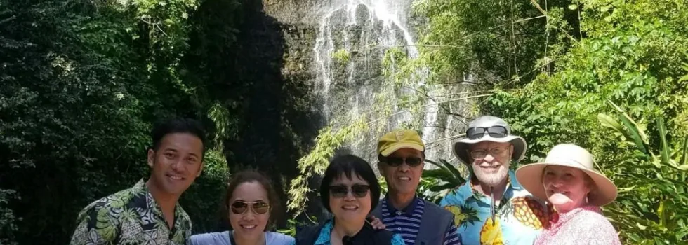 Family in front hana waterfall