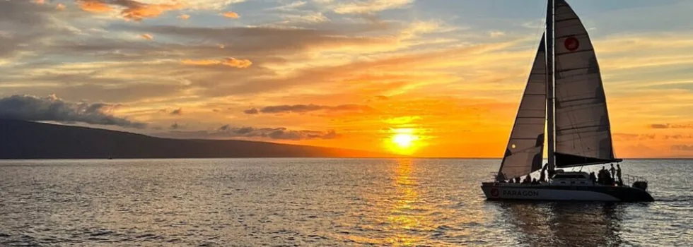 Maui sunset catamaran whispy clouds
