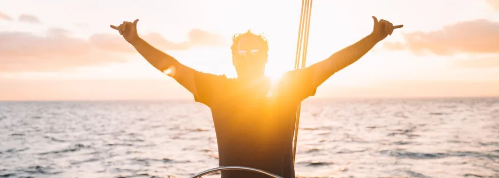 Man rejoicing lahaina catamaran sunset