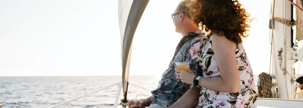 Couple holding hands lahaina catamaran