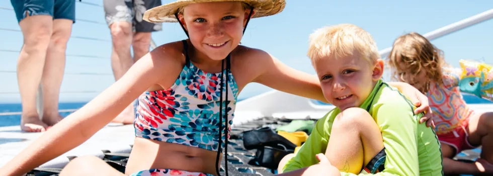 Happy children snorkel catamaran maui