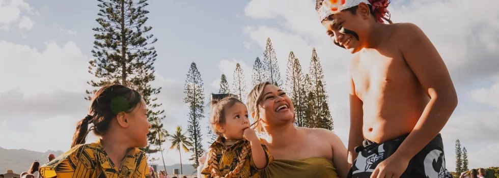 Baby meets luau dancer