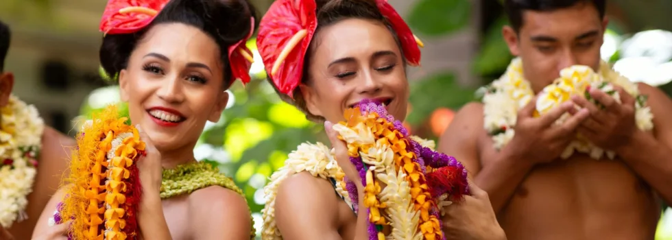 Performers smelling sweet lei