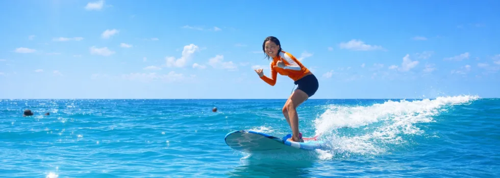 Girls learn to surf oahu
