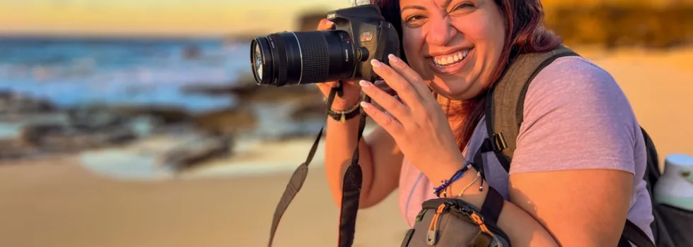 Happy photographer woman