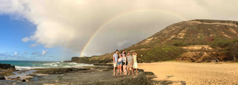 Family portrait sandy beach rainbow