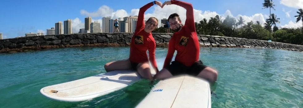 Cute couple surf lesson waikiki